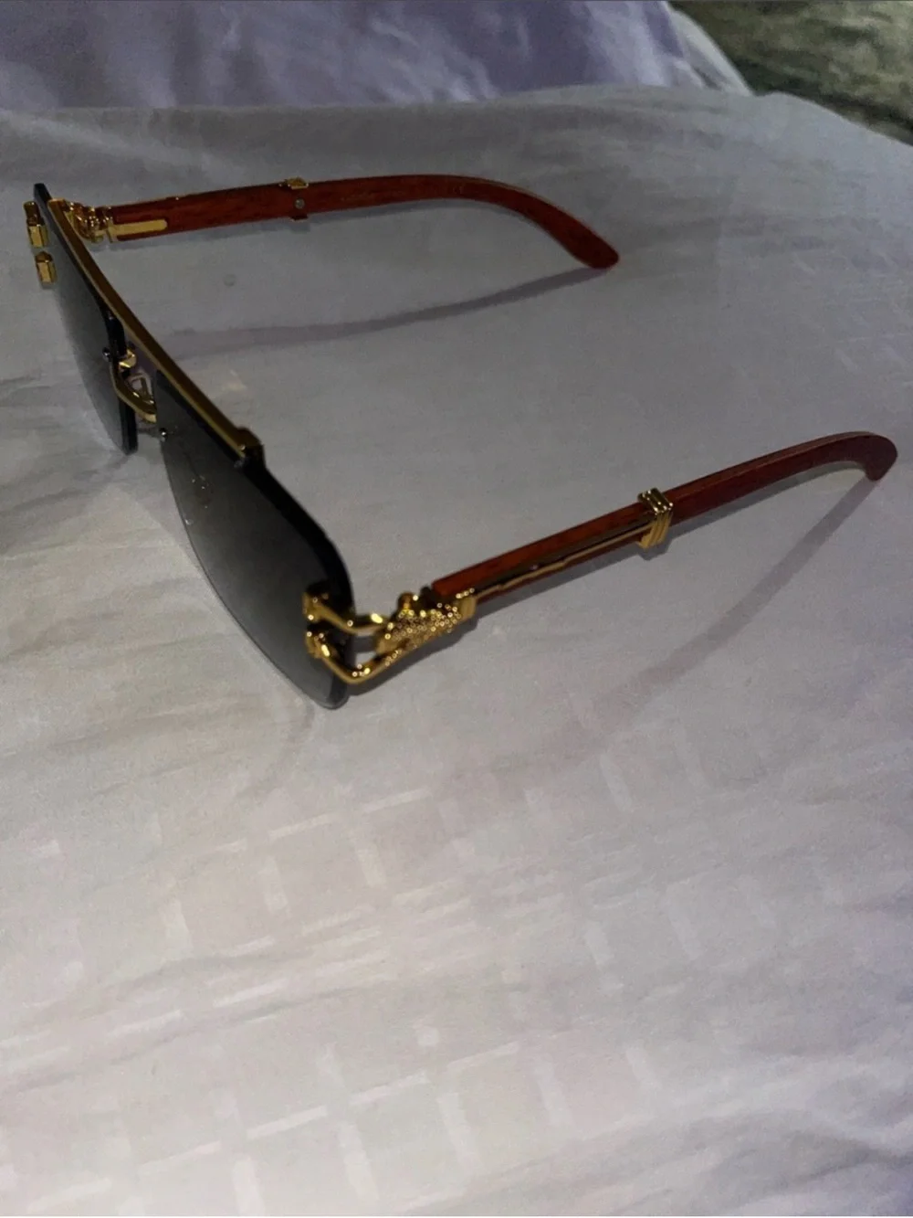 Men's Rimless Sunglasses with Gold Accents and Brown Temples
